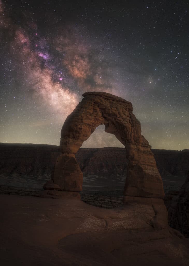 Milky Way core behind Delicate Arch in Arches National Park, Utah